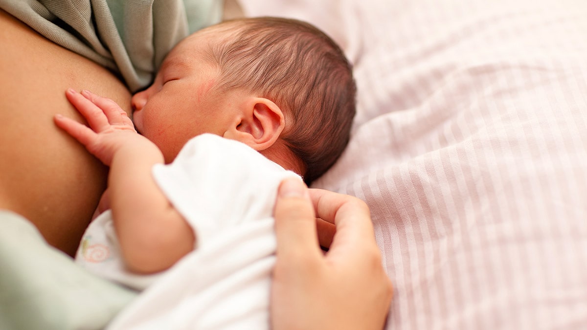 newborn baby breastfeeding